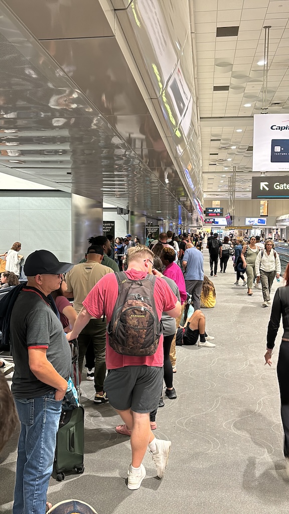Queueing for the Frontier helpdesk in Denver airport at midnight