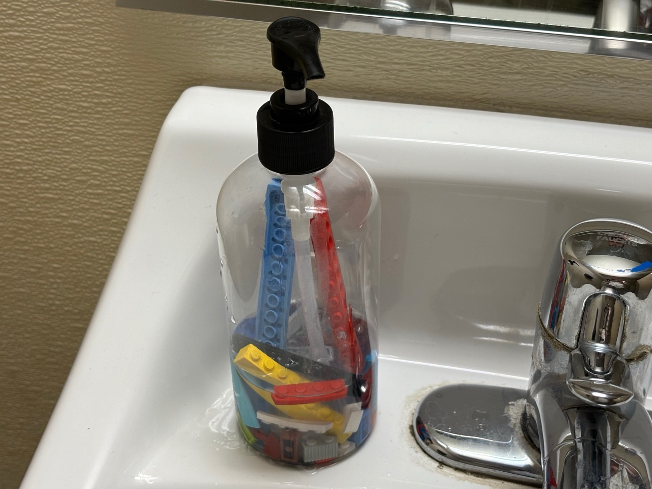 Soap dispenser with lego in it