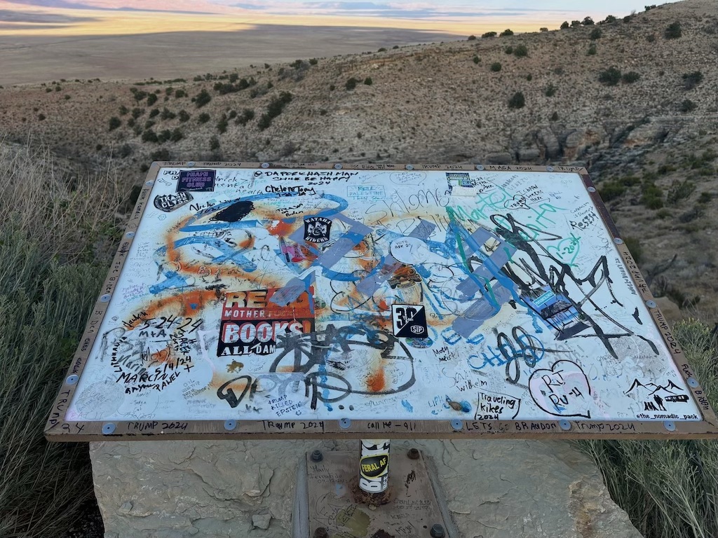 Highway 89 viewpoint sign scrawlings